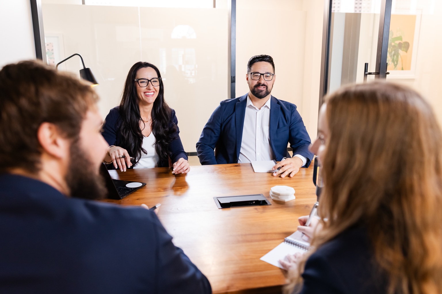 Bounds Law attorneys consulting with a business owner